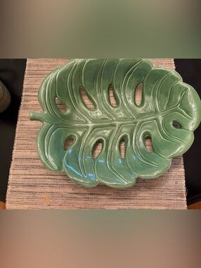 Pier 1 Imports #4217025 green porcelain serving bowl shaped likea monstera leaf.